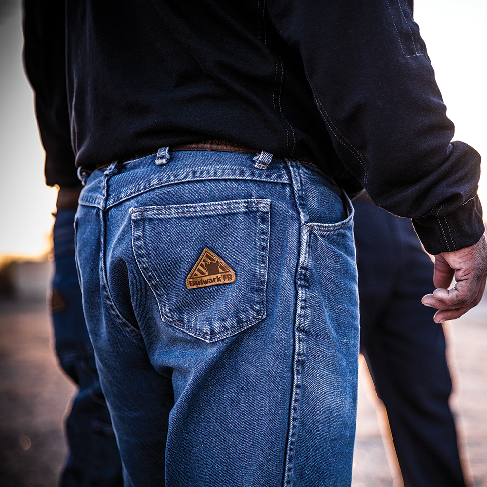 Man wearing Dempsey Uniform flame resistant denim jeans
