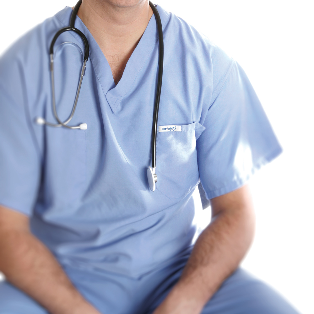 Medical professional wearing a Dempsey Uniform PerforMAX scrub shirt