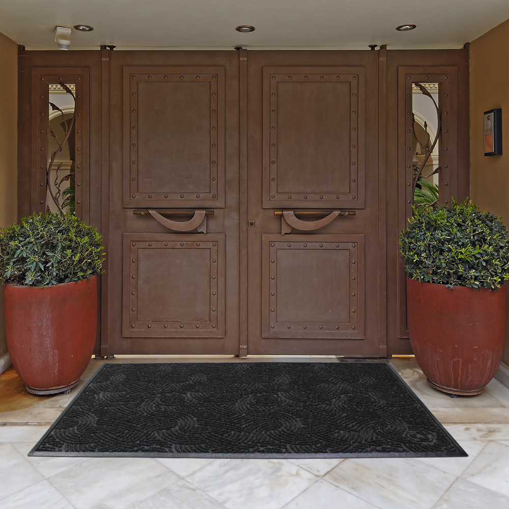 Dempsey Uniform Waterhog mat in a doorway